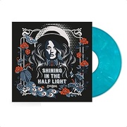 SHINING IN THE HALF LIGHT
